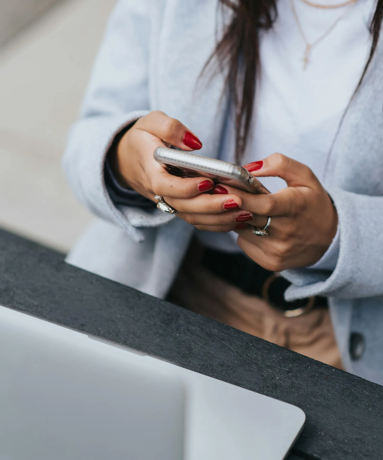 A woman checking messages on her phone