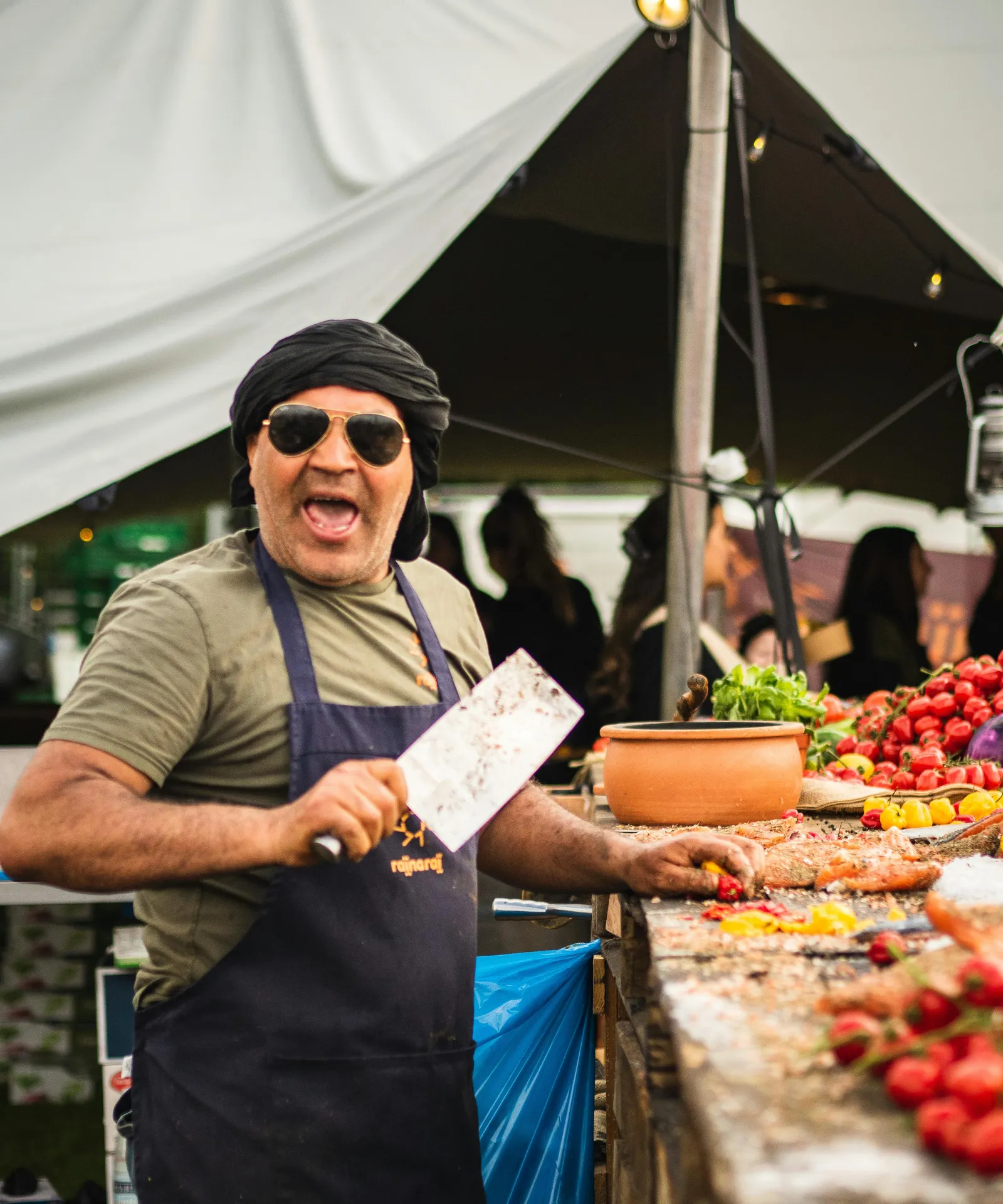 A market vendor at a produce stall